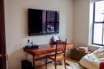 Den with Flat Screened TV